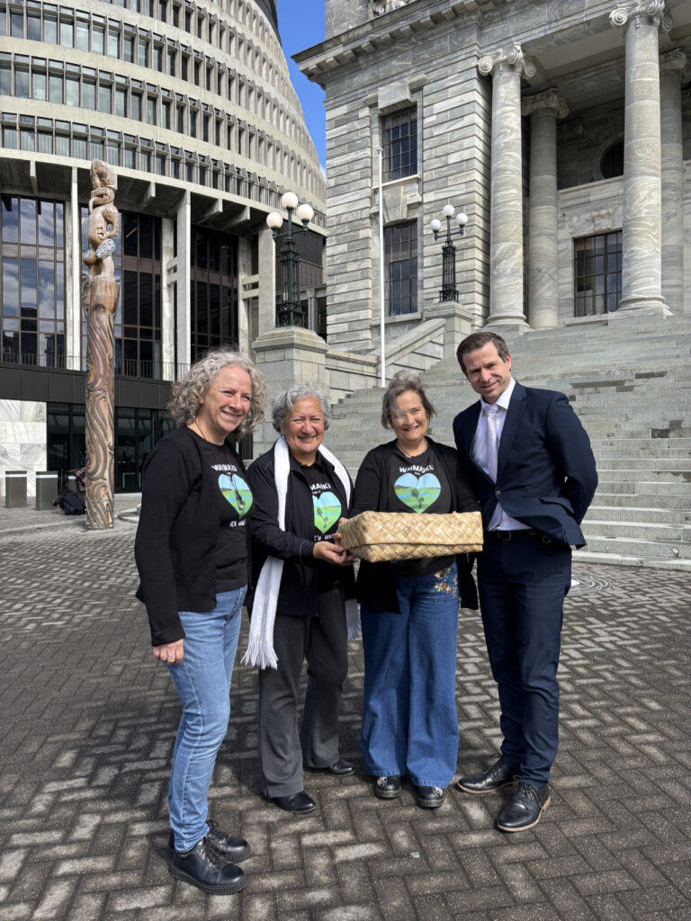 Chris Penk receiving the petition