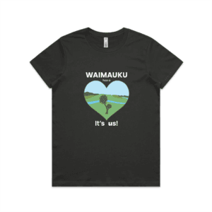 Picture of black T-shirt with a green-blue heart and the writing "Waimauku has a heart - it's us!"
